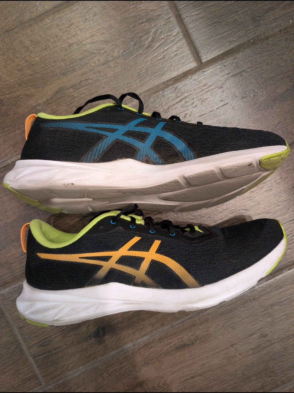 Asics Versablast 2 Black Running Shoes with Blue and Gold Logos